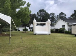 White Bounce House W/ Balloon Garland